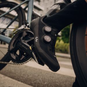 Close-up of rider wearing Macha Pro in black.